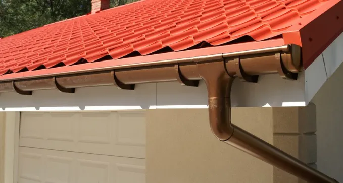 instalar canalones de chapa con ganchos para canalones en la teja, en soria